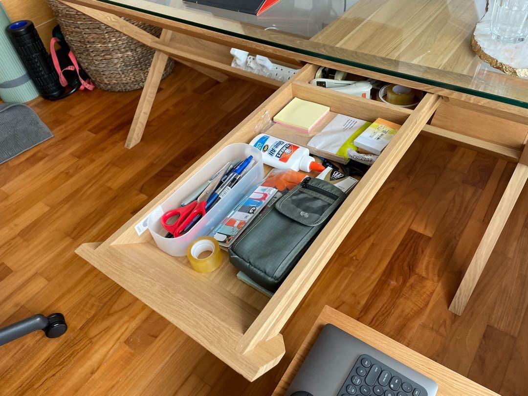 Study Table (Category: Tables & Sets) located in Singapore. Submitted by davidandrew (Listing ID 1140700518, Image 3). Description: As new modern Scandinavian style glass-top desk. Dimensions 148cm x 83cm x 72cm. Bought in 2018 for $2000. Hardly used. Selling $950 ono. .