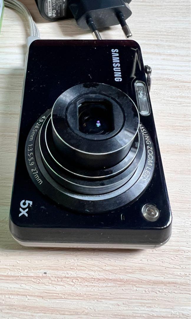 Samsung PL150 digital camera 12.4 megapixels with front facing lcd