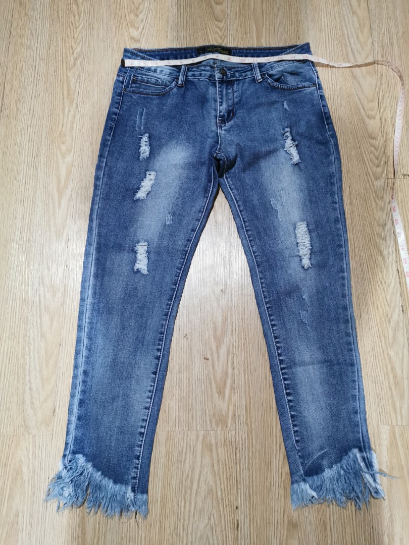 Tattered jeans, Women's Fashion, Bottoms, Jeans on Carousell