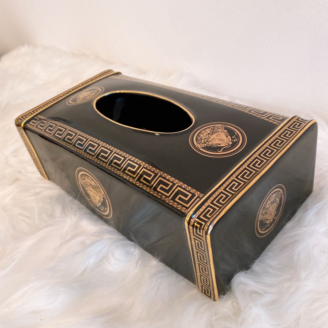 Golden Versace pataren on black box. Tissue box template concept