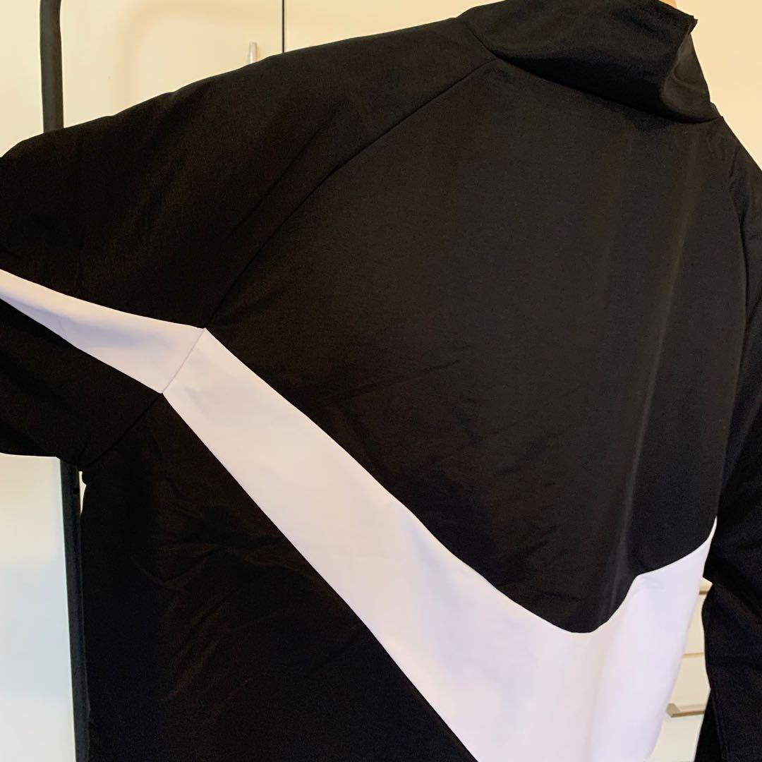 swoosh windbreaker