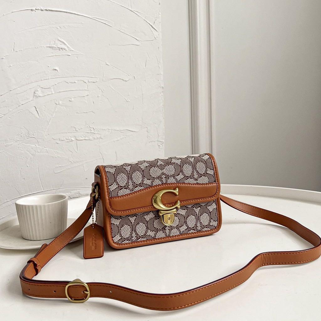 Coach signature discount jacquard bag
