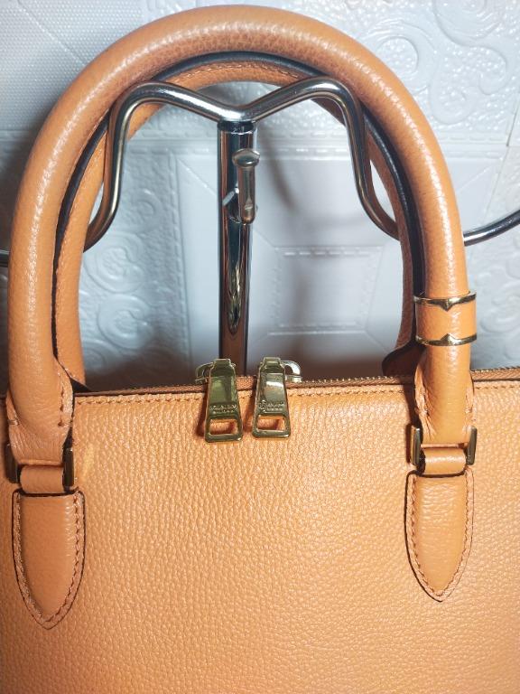 Double M MILANO TWO-WAY BAG IN LIGHT ORANGE (Category: Luxury Bags & Wallets) located in Pateros City. Submitted by chic_barn (Listing ID 1135553680, Image 2). Description: Original Double M- medium to large size Pretty and fresh look in actual. God hardwares. No major flaws, just minimal signs of wear. .