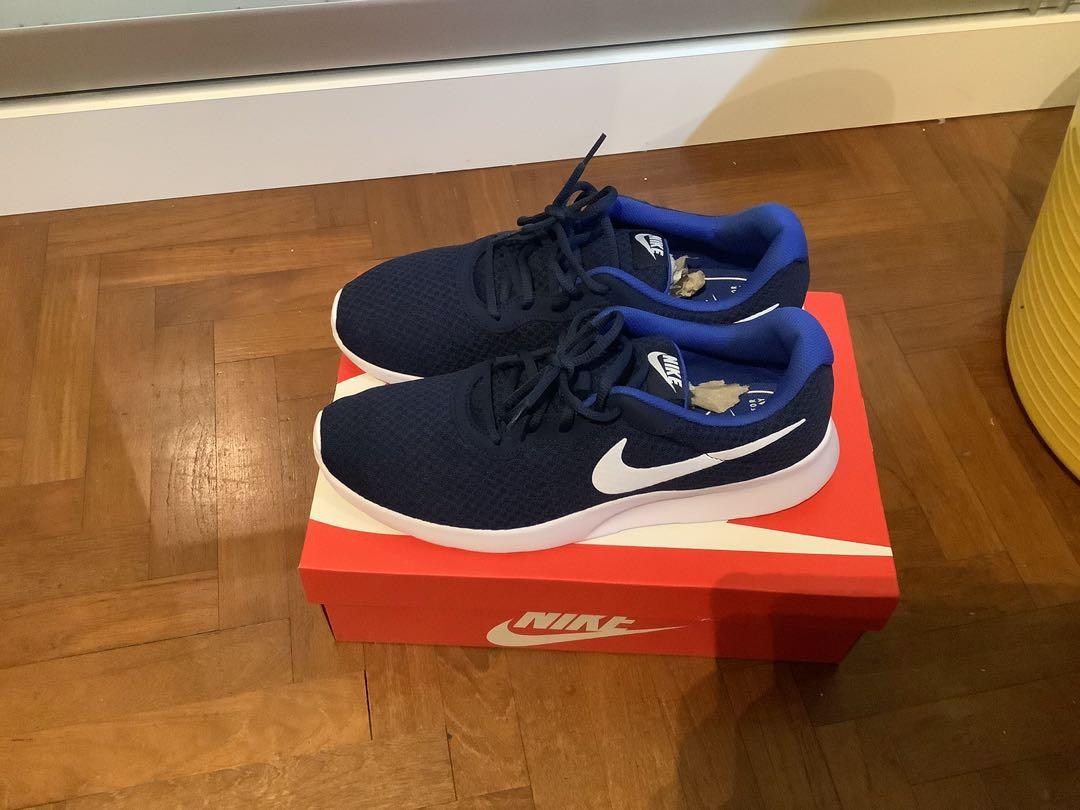 Nike tanjun size sales 11