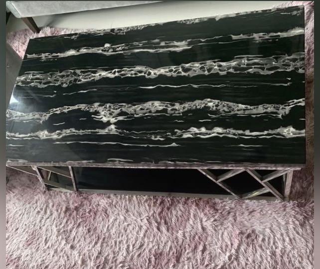 Solid marble table (Category: Tables & Sets) located in Singapore. Submitted by liquid6297 (Listing ID 1135476051, Image 1). Description: Heavy, strong and sturdy table. Table measurement in cm : L120x W65x H38 2 small chips but not visible, please refer to pictures. Please arrange own transportation/delivery..