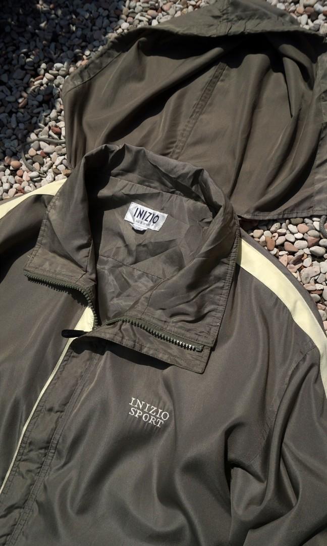 olive green windbreaker jacket