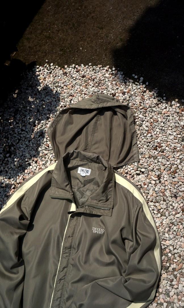 olive green windbreaker jacket