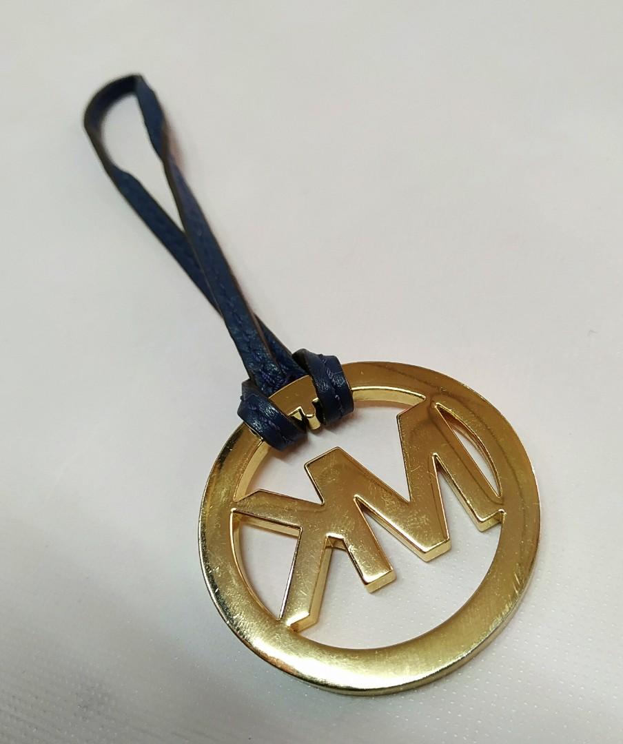 Michael kors hanging logo charm online