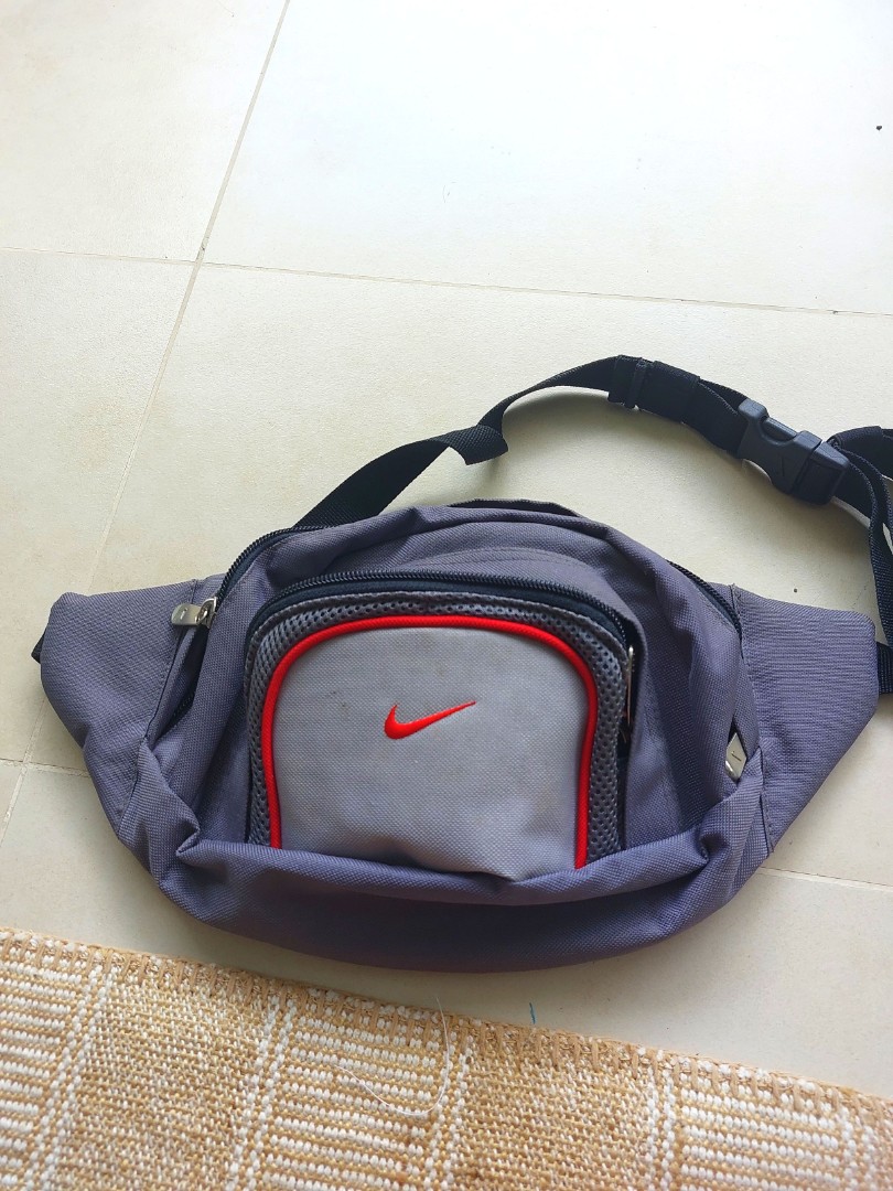 Nike waist running pouch, Men's Fashion, Bags, Sling Bags on Carousell