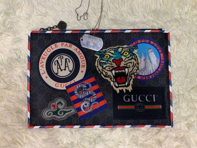 Gucci clutch tiger store
