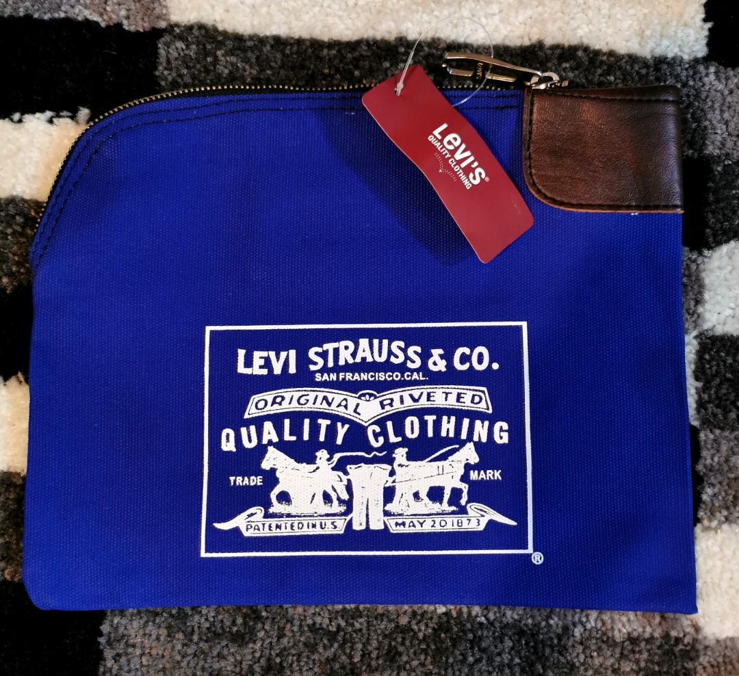 Levi's Clutch Bag, Luxury, Bags & Wallets on Carousell