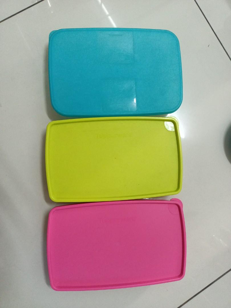Tupperware container (Category: Food Organisation & Storage) located in Butterworth. Submitted by jsprelovedb (Listing ID 1135892522, Image 2). Description: 1. Long (Blue/green RESERVED/pink RESERVED) RM10 each 2. Small round (blue/orange) RM6 each 3. Transparent round RM7 SOLD 4. Yellow medium size RM7 SOLD Yellow big size RM9 5. Round (purple/pink x2) RM7 each SOLD 6. Flat RM6 SOLD Medium (purple x2) RM9 each Large RM10 SOLD.