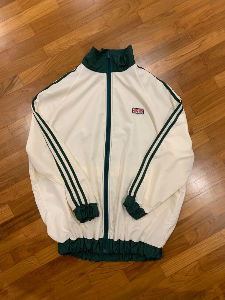 dark green windbreaker