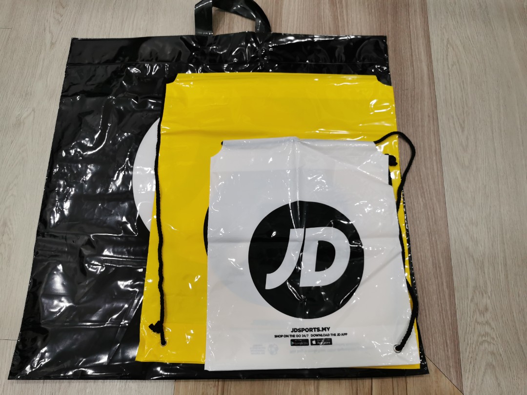 Free plastic jd duffle bag 2025