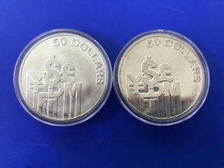 Singapore 1980 & 1981 Financial Center $50 UNC silver coin.