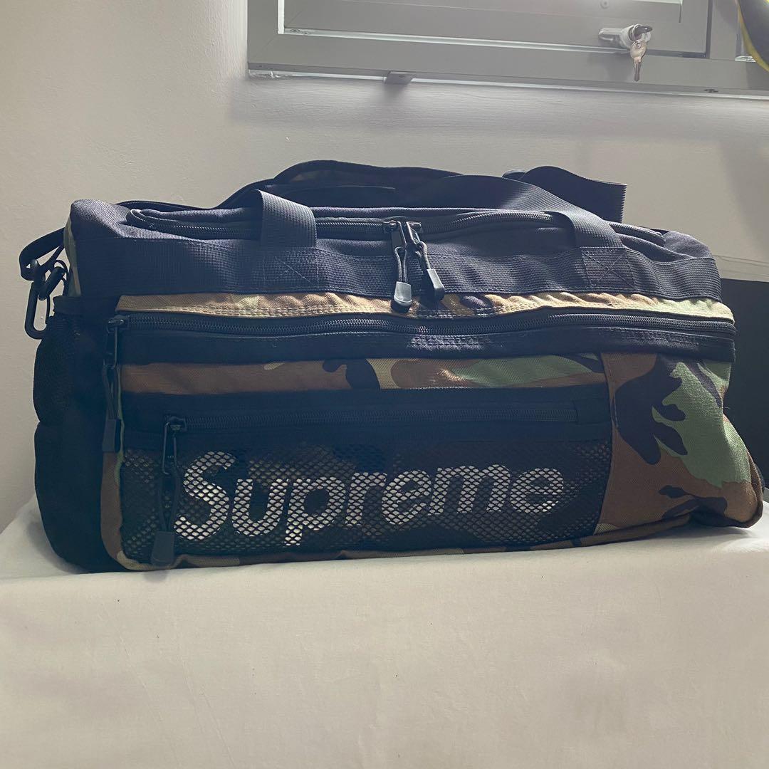 Supreme camo best sale duffle bag