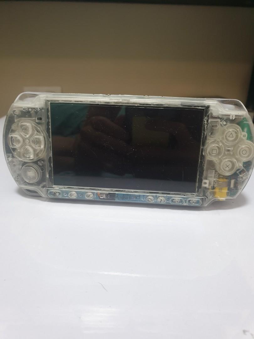 Psp 3000 (Playstation Portable) (Category: PlayStation) located in Quezon City. Submitted by itemsforadoption (Listing ID 1136376877, Image 1). Description: Rfs: Its 2022! Happy New Year. Now is a time to be joyous and declutter. And I'm doing just that this season. Playstation Portable 3000. Sort of transparent look and comes with screen protector, memory card and games installed. Like Tekken, God Of War. Originally bought this to test Umd games