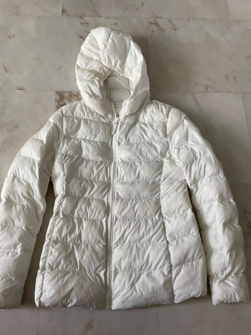 Winter Jacket (Category: Babies & Kids Fashion) located in Singapore. Submitted by mickeymouss (Listing ID 1136294259, Image 1). Description: Uniqlo winter jacket size 150, wore few times. Giving away free winter pants from Korea..