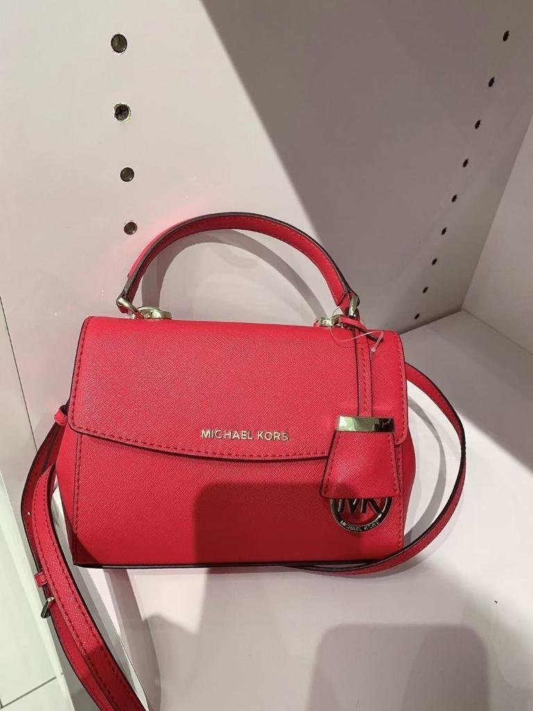 in stock: Carnival Sale! 100% original Michael Kors Ava Extra-Small  Saffiano Leather Crossbody red, Women's Fashion, Bags & Wallets, Cross-body  Bags on Carousell