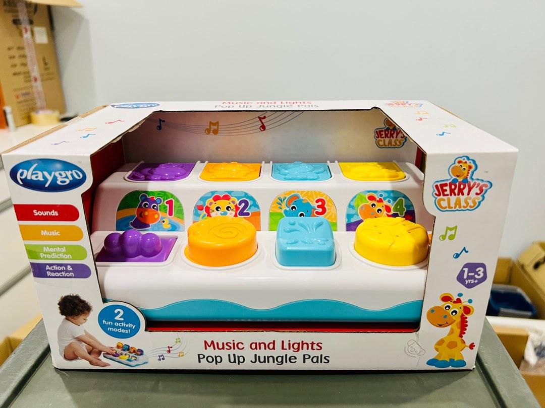 Playgro music and lights 2025 pop up jungle pals