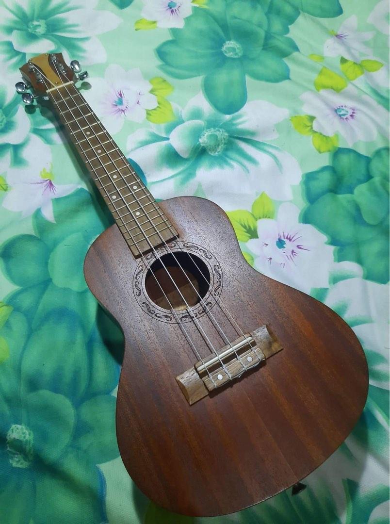 QTE Concert Size Mahogany Ukulele (Category: Musical Instruments) located in Minalin. Submitted by kkplushies (Listing ID 1188182474, Image 2). Description: .