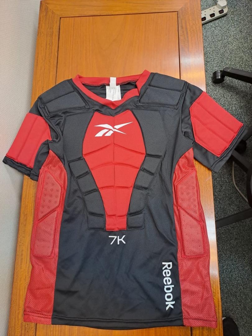 Reebok 7k padded shirt top