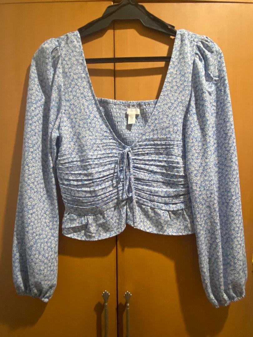 H&M Light Blue Ruched Long Sleeve Top (Category: Blouses) located in Pasig City. Submitted by preloveddd_ds (Listing ID 1189908482, Image 3). Description: Bought for 999 NEVER USED Fits US 2-4 comfortably Super flattering on but no longer my style Helping tags Floral Cottage core Dainty top Ruffles Ruche H&M Crop top Classy Girly .