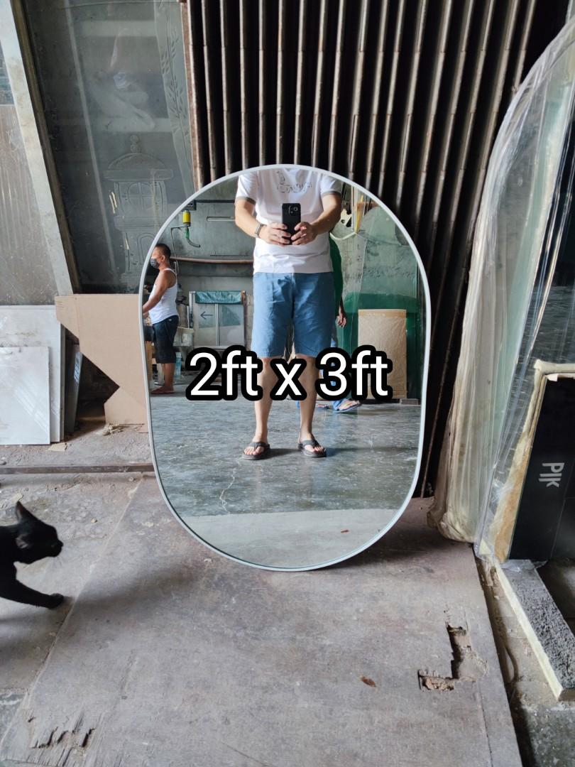 Oval mirror with frame (Category: Mirrors) located in Malabon City. Submitted by mirrors.ph (Listing ID 1189790725, Image 1). Description: Oval mirror with white aluminum frame and plywood backing. Using 6mm thick copper free lead free mirror. Size: 2ft x 3ft P1620 Add P100 if with back hook. Available colors gold, glossy black, matte black, white and silver aluminum frame. Customize sizes and shapes are welcome..