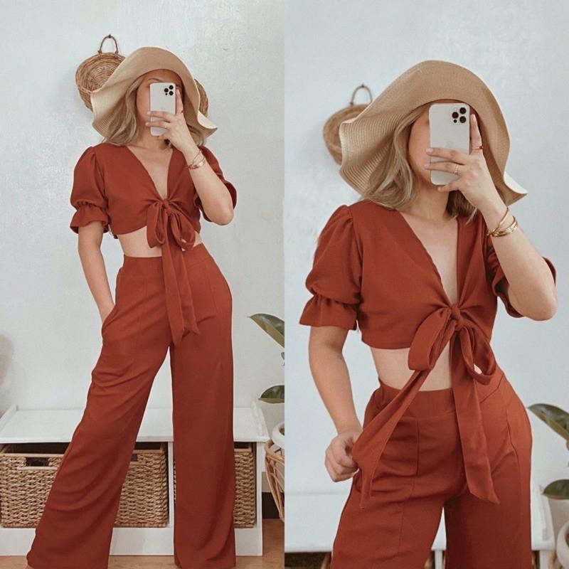 Red Coordinates Crop Top and Pants (Category: Sets or Coordinates) located in Manila. Submitted by swimfitstyle (Listing ID 1188893754, Image 1). Description: Pants With side Pockets Pants length-41 inches Tie around crop top .