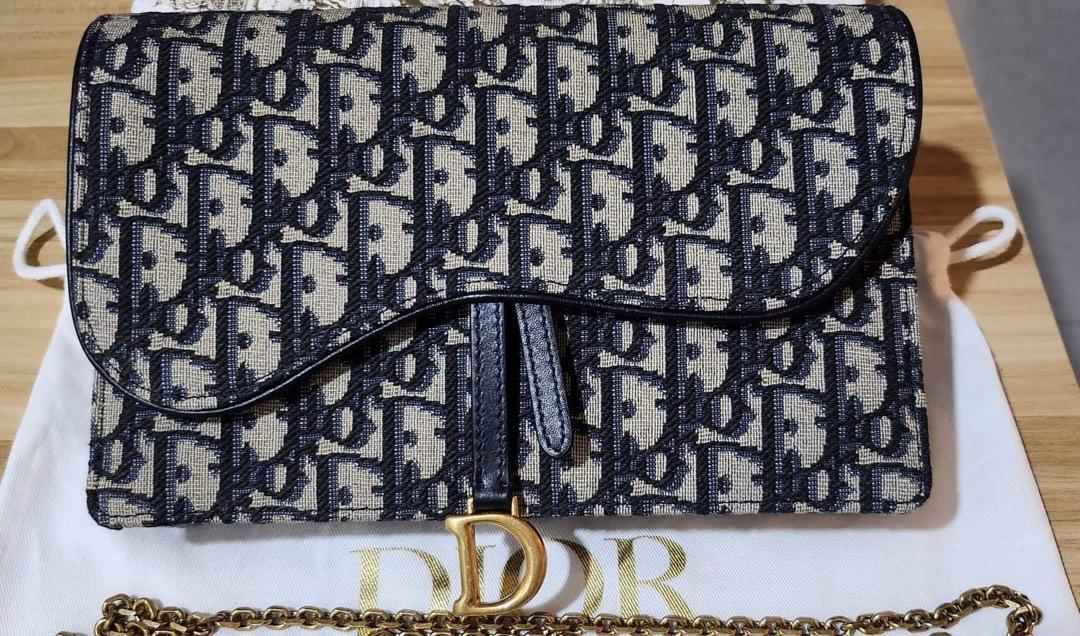 Dior Saddle Pouch with Chain (Category: Luxury Bags & Wallets) located in Mandaluyong City. Submitted by m0530 (Listing ID 1190103857, Image 1). Description: Brand new and guaranteed authentic Dior Saddle Pouch with Chain This is bigger than the regular wallet on chain Comes with dust bag, cards and box Purchased in Spain RFS: Funding for a new bag Payment via BDO bank deposit Shipping c/o buyer .
