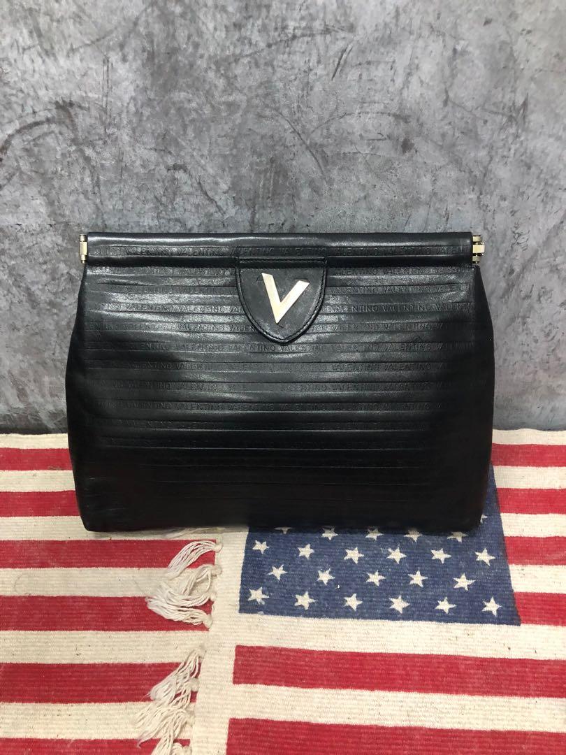 Mario Valentino Authenticated Leather Clutch Bag