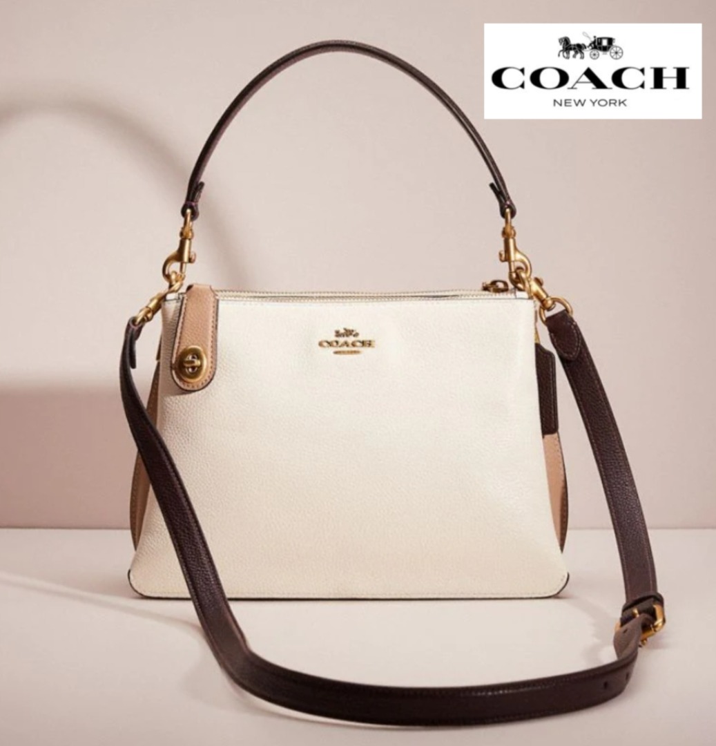 Coach double zip sling bag hotsell
