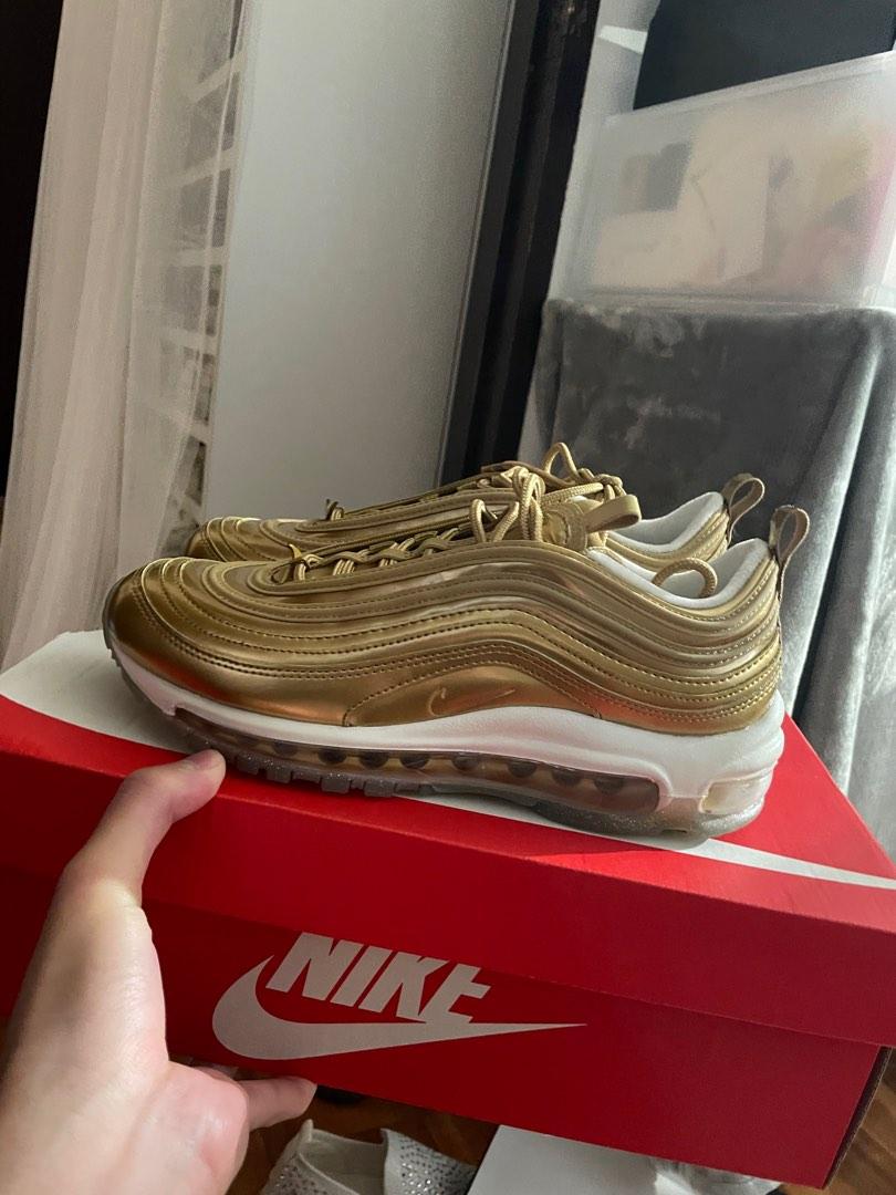 Nike metallic gold on sale