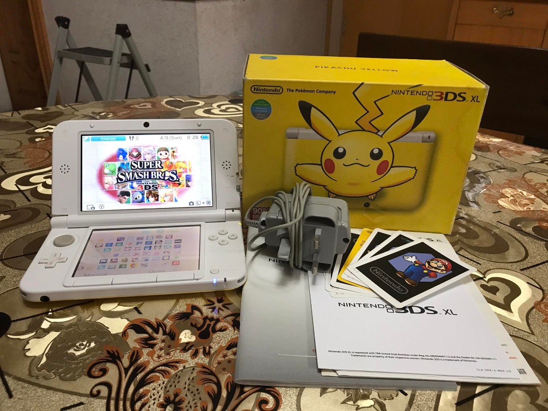 Nintendo 3ds XL Pikachu Edition + 64gb Memory card with Full of games