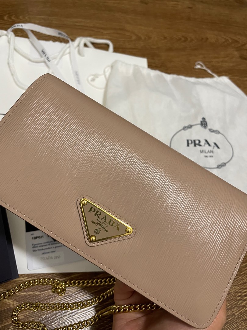 Authentic Prada Saffiano WOC in Bluette, Luxury, Bags & Wallets on Carousell