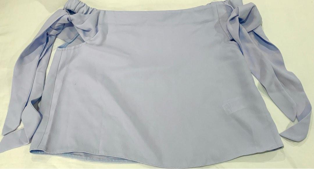 Topshop tie sleeve off shoulder blouse (Category: Blouses) located in Quezon City. Submitted by decluttering456 (Listing ID 1190031371, Image 2). Description: Topshop off shoulder top Tie sleeve Color: Light Blue Rfs: not being used Sf shouldered by buyer .