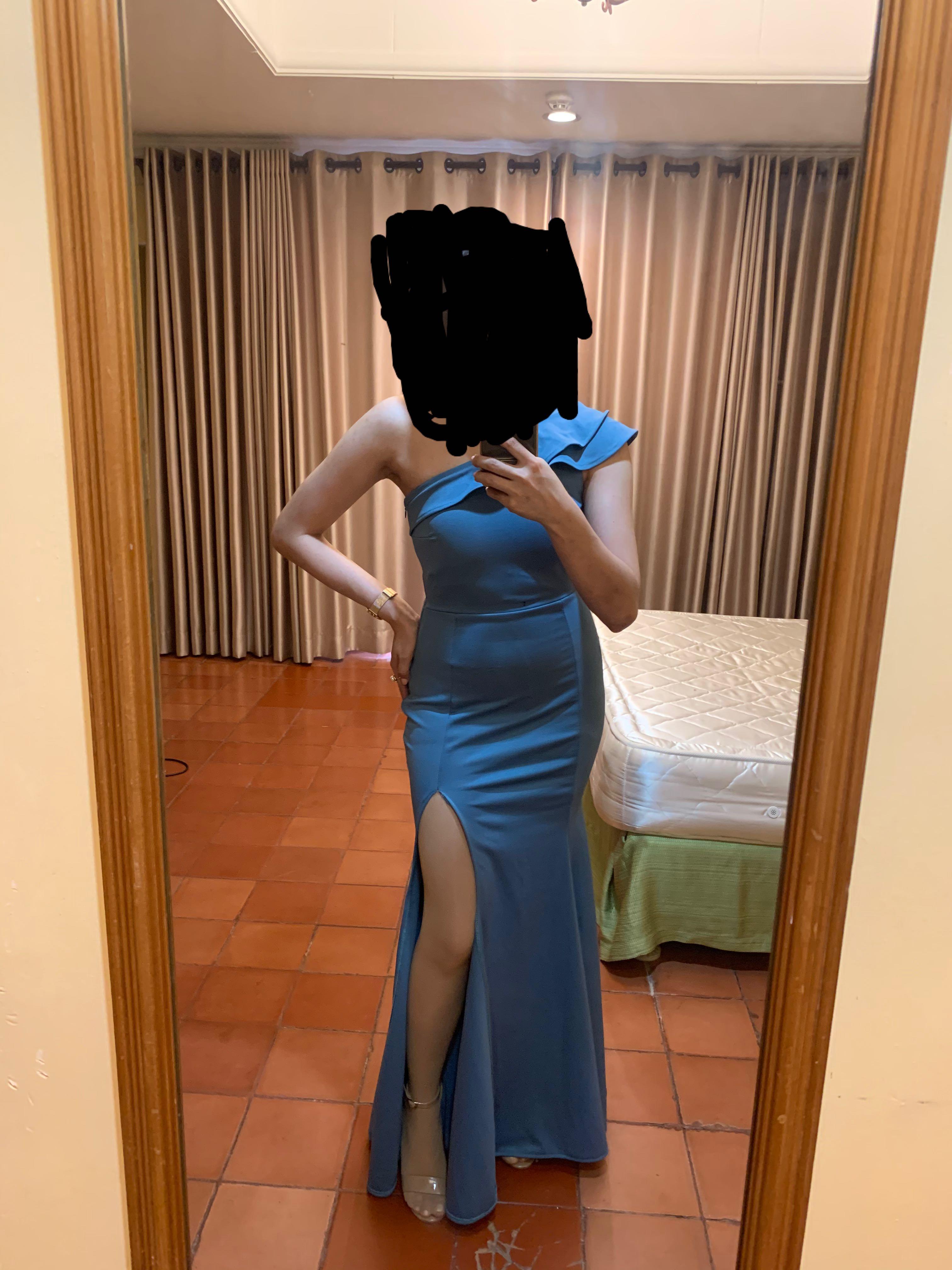 Blue gown (Category: Evening dresses & gowns) located in San Juan City. Submitted by chelly7 (Listing ID 1190275934, Image 1). Description: Used once as a bridemaids. Size Waist - 25 Height -I’m 5flat wearing 3 inches heels in the picture #eveninggown #formaldress #longgown.