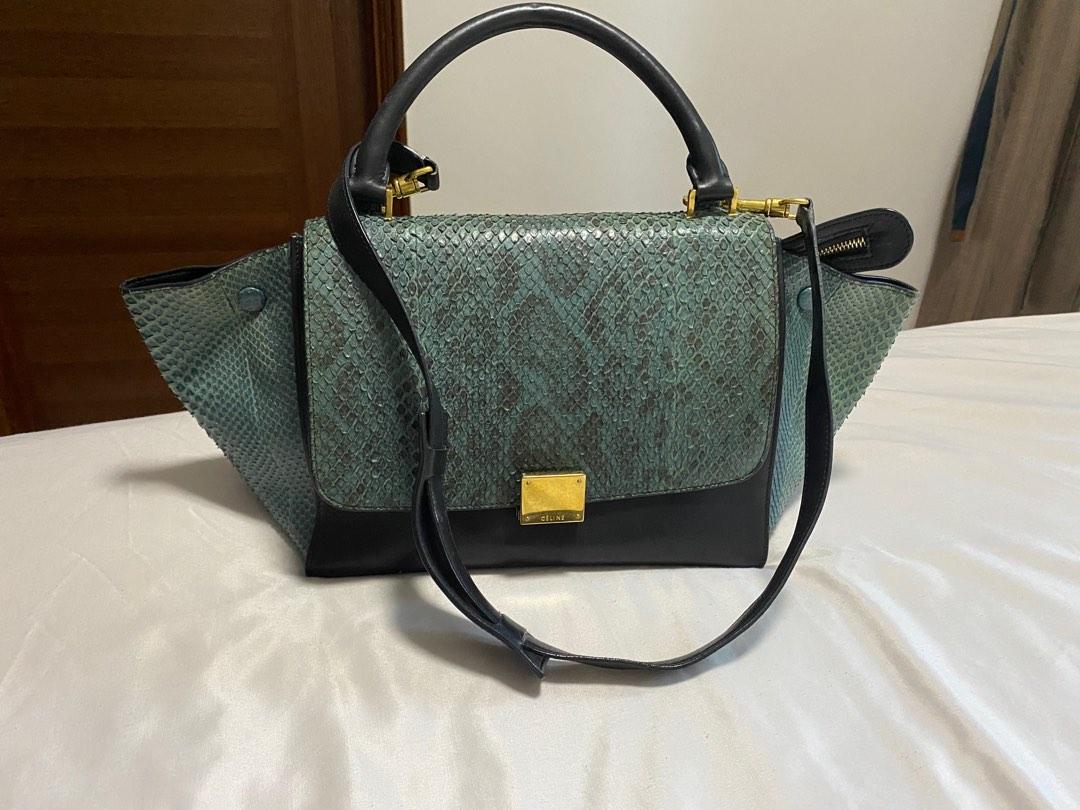 Celine Trapèze python handbag (Category: Bags & Wallets) located in Singapore. Submitted by jinglingbell (Listing ID 1190130974, Image 2). Description: Classic navy blue, python skin Celine trapeze calf leather bag, well maintained, light scratches. Shoulder strap included. .
