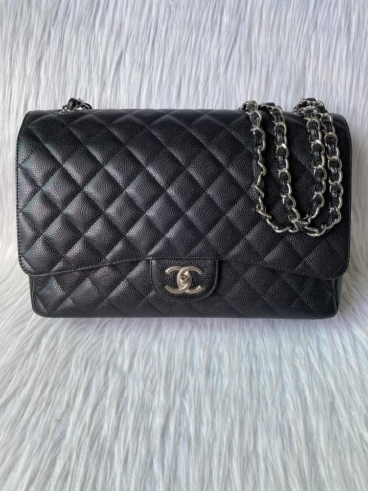 Chanel Classic Maxi Double Flap Bag (Category: Luxury Bags & Wallets) located in Manila. Submitted by bagislifeshop (Listing ID 1190188944, Image 2). Description: ▪️Chanel Classic Maxi Double Flap Bag▪️ ☑️Available in Manila ✅Series 15 ✅Condition: 8.8/10 ✅Colour: Black in SHW ✅Material: Caviar Leather ✅Dimensions: 33 x 23 x 10cm ✅Inclusions: Dust bag, booklet, hologram sticker and entrupy certificate ✅Retail price: $15,050.