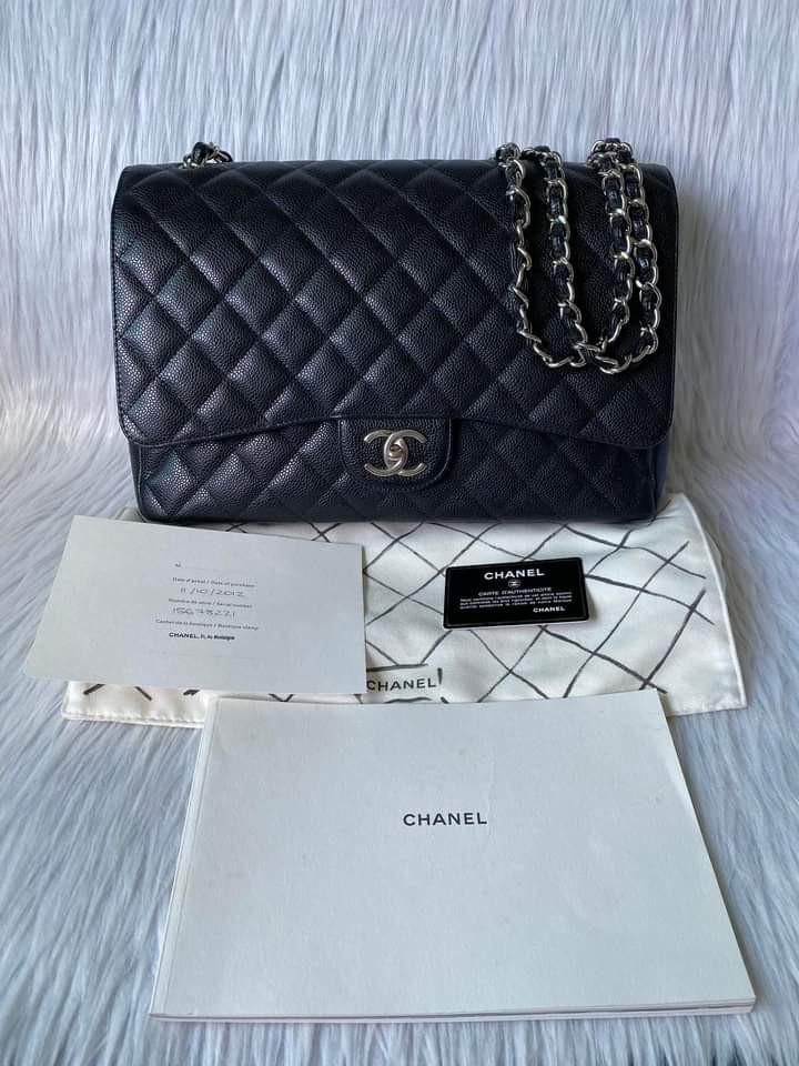 Chanel Classic Maxi Double Flap Bag (Category: Luxury Bags & Wallets) located in Manila. Submitted by bagislifeshop (Listing ID 1190188944, Image 1). Description: ▪️Chanel Classic Maxi Double Flap Bag▪️ ☑️Available in Manila ✅Series 15 ✅Condition: 8.8/10 ✅Colour: Black in SHW ✅Material: Caviar Leather ✅Dimensions: 33 x 23 x 10cm ✅Inclusions: Dust bag, booklet, hologram sticker and entrupy certificate ✅Retail price: $15,050.