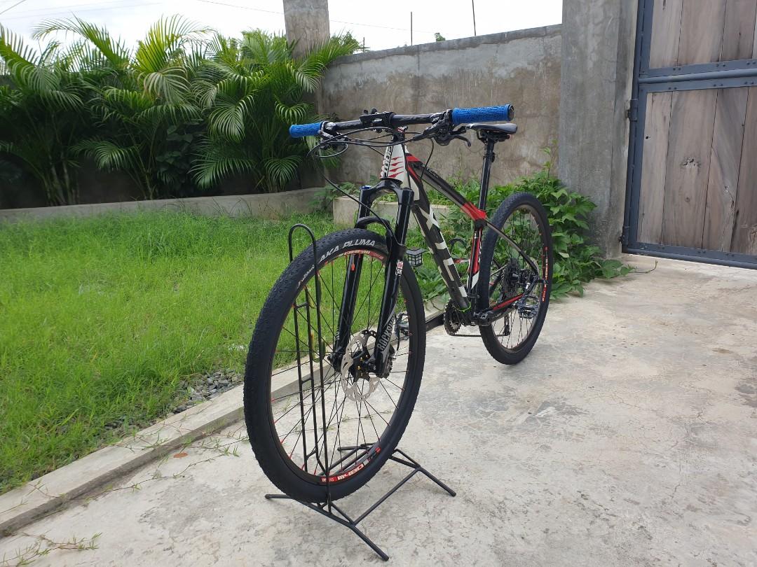 GIANT XTC 27.5 MTB (Category: Bicycles) located in Bantay. Submitted by backyardcyclist (Listing ID 1190221724, Image 2). Description: GIANT XTC 27.5 Mountain bike custom built (accdg to owners preference) Frame: original and legit aluminum AL ALUXX SLR internal cable routing for RD and FD, rear brake cable is external thru downtube tapered headtube pressfit BB size Small color red black white Drivetrain: Shimano Deore XT M8000 2x, FC 34/24 T wit