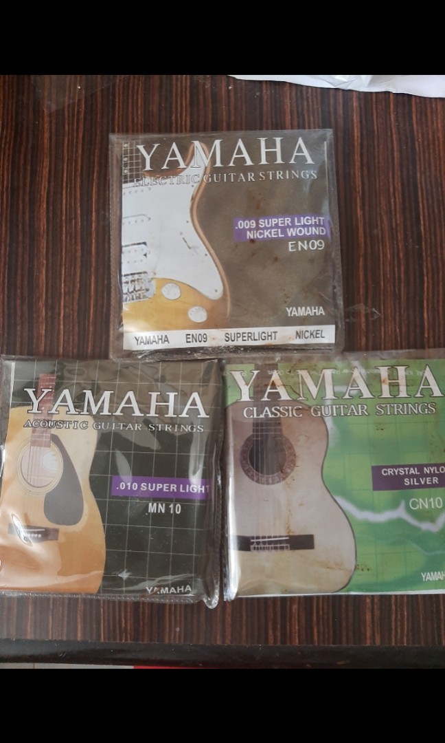Brand new acoustic or electric or classical guitar string packet ...