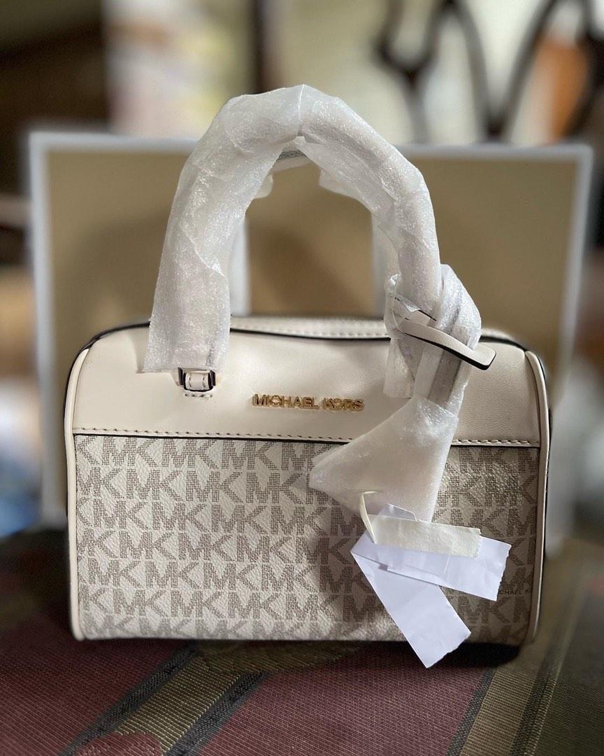 Michael Kors Extra Small Signature Duffle Crossbody Bag in White (with  Magnetic Gift Box), Luxury, Bags & Wallets on Carousell