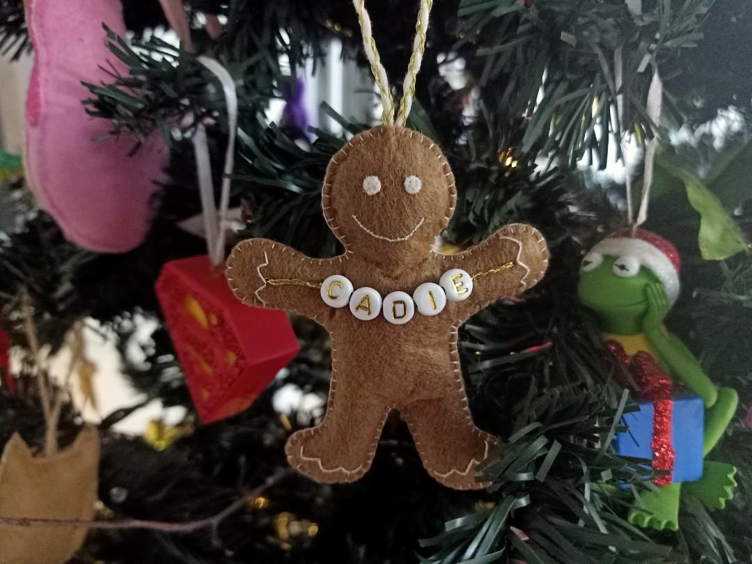 Personalized Gingerbread man Christmas Ornament (Category: Handmade Craft) located in Mandaluyong City. Submitted by patchandpast (Listing ID 1189942953, Image 2). Description: Hand-stitched personalized gingerbread man Christmas ornament available for preorder. Send us a message and have your name put on the gingerbread man. 😊.