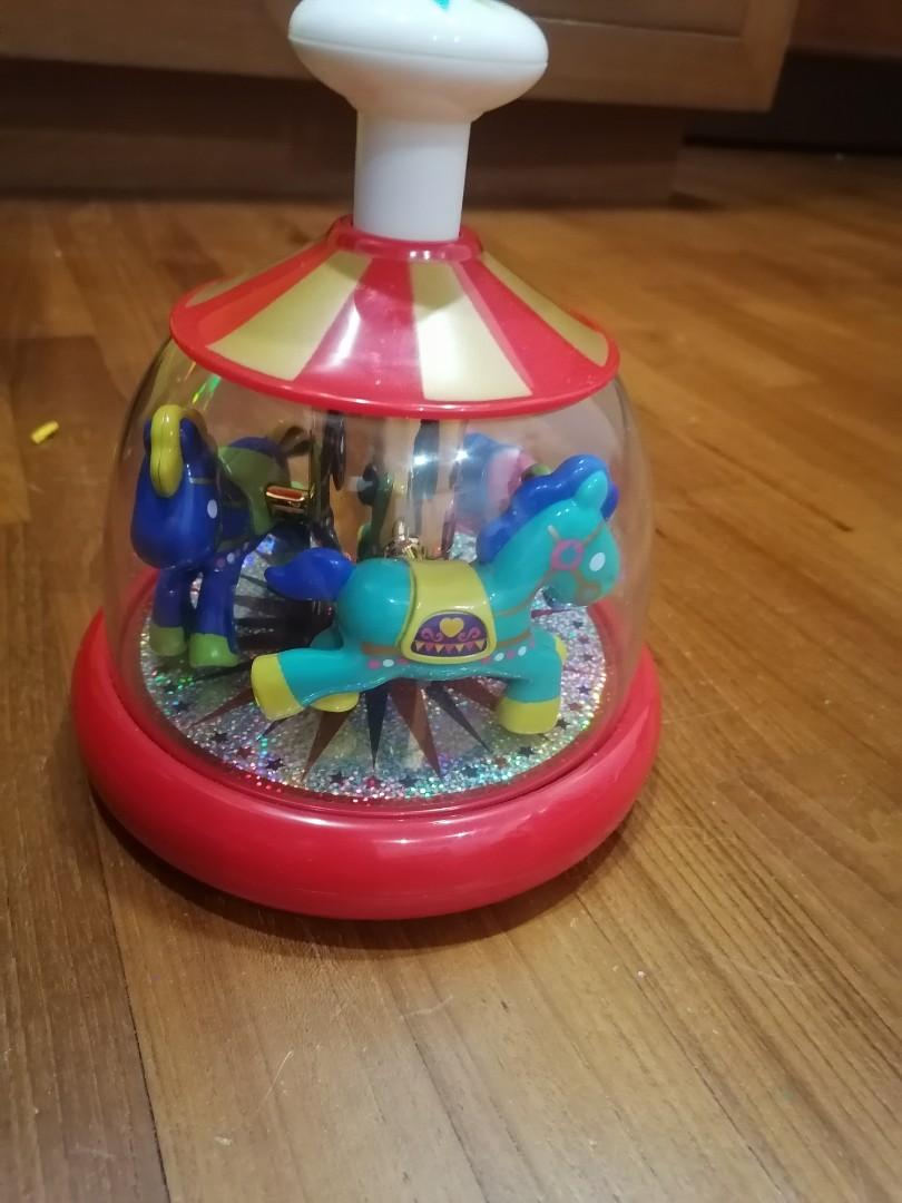 Push and spin carousel on sale