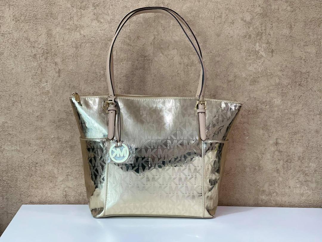 Buy Pre-owned & Brand new Luxury Michael Kors Jet Set Medium Snap Pocket  Tote Online