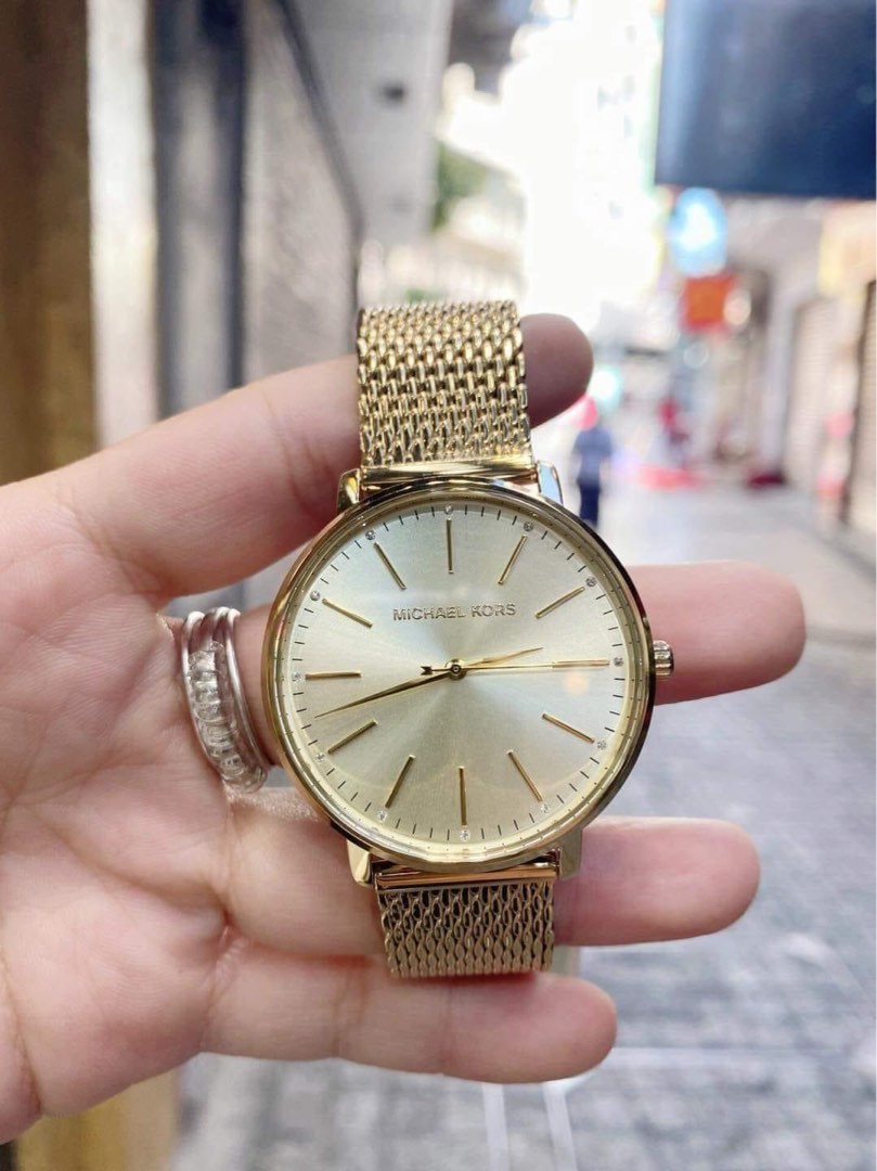 Adjusting michael kors watch strap cheap