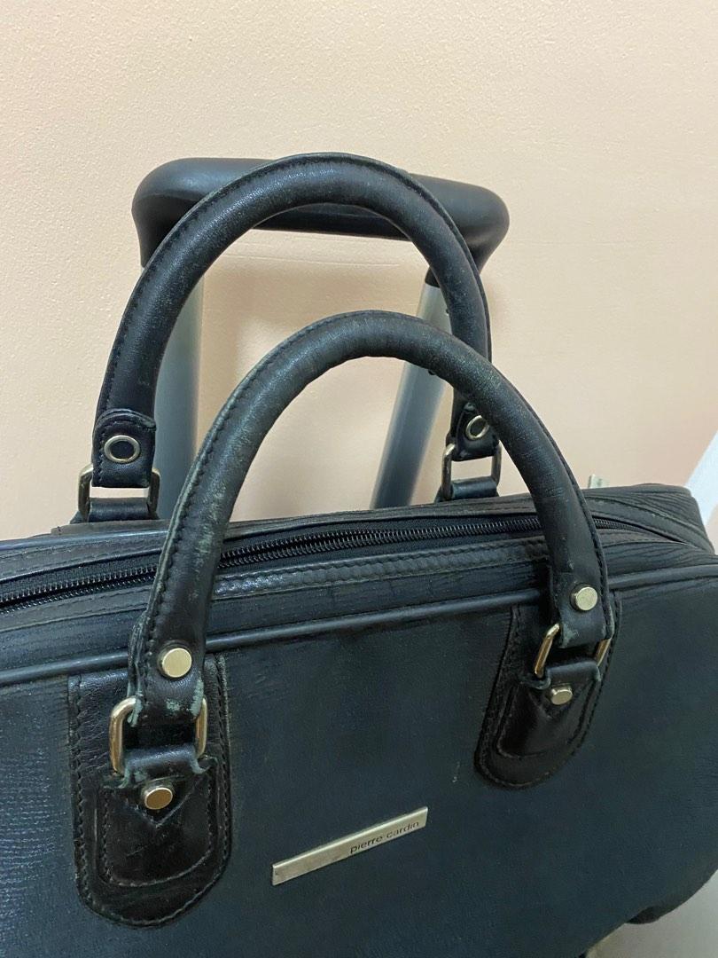 Pierre Cardin Travel Bag Authentic (Category: Luxury Bags & Wallets) located in Navotas City. Submitted by Miming082 (Listing ID 1190382318, Image 2). Description: -very well loved by my aunt -obvious signs of usage and discoloration - a bit of cleaning and the item is usable already - authentic - message me if you have any questions or if need more pics 😁.