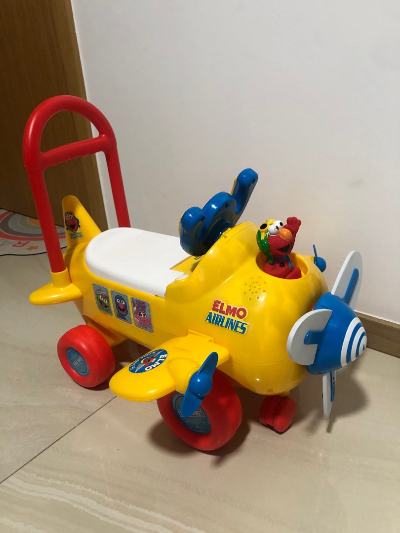 Elmo airplane sale ride on toy