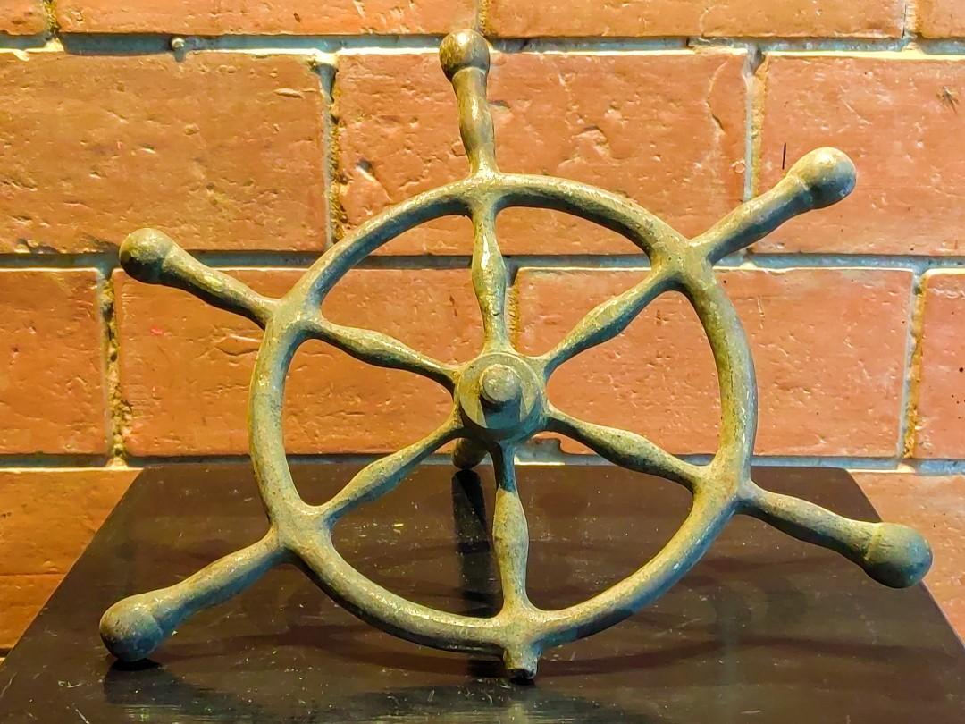 Very Old Solid Brass Ship Steering Wheel Helm (Category: Vintage Collectibles) located in Manila. Submitted by sinaunang_gamit (Listing ID 1190410194, Image 1). Description: Very Old Solid Brass Ship Steering Wheel Helm Made of Solid Brass Weighs Very Heavy Selling as is condition Diameter : 12 inches 3500 only.
